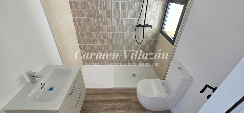 Baño ensuite The Elysian Collection