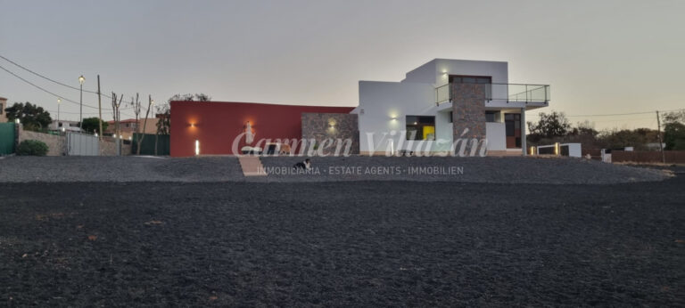 atardecer fachada frontal villa los estancos