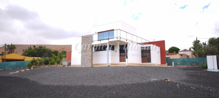 fachada villa los estancos